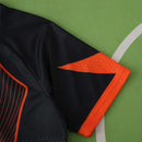 CAMISETA BARCELONA NEGRA Y NARANJA HOMBRE 25/26