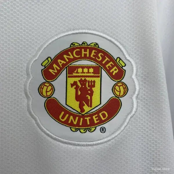 MANCHESTER UNITED II EDICIÓN CHAMPIONS LEAGUE RETRO HOMBRE MANGA LARGA