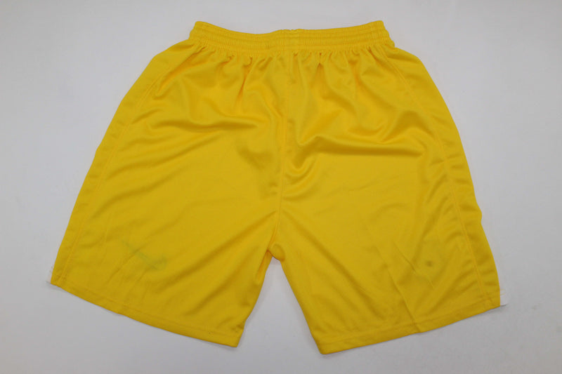 PANTALONES CORTOS ATLETICO DE MADRID AMARILLO PORTERO 25/26
