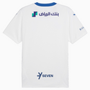 Al-Hilal 20242025 - Camiseta alternativa Al-Hilal - Puma Al-Hilal - Liga Profesional Saudí - Copa del Rey de Campeones - Champions League - Diseño moderno - Detalles únicos - Blanco - Azul - Gris - Gola azul - Escudo del Al-Hilal - Logo de Puma - Identidad del club - Historia del club - Tecnologías innovadoras - Confort - Rendimiento.