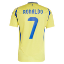 Al-Nassr 20242025 - Camiseta Al-Nassr - Uniforme titular Al-Nassr - Adidas Al-Nassr - Liga Profesional Saudí - Copa del Rey de Campeones - Champions League - Diseño moderno - Detalles únicos - Amarillo - Azul - Negro - Gola redonda - Escudo del Al-Nassr - Logo de Adidas - Identidad del club - Historia del club - Tecnologías innovadoras - Confort - Rendimiento.