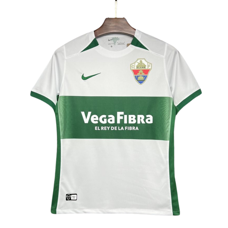 Elche - Camiseta local - Nike - La Liga 2 - Temporada 2024-2025 - Diseño - Detalles - Equipación - Fútbol - LaLiga - España - Club - Nueva camiseta - Lanzamiento - Equipamiento deportivo - Fútbol español - Diseño moderno - Tradicional - Clásico - Moderno - Estilo - Rendimiento - Confort - Tecnología - Innovación - Blanca - Verde.