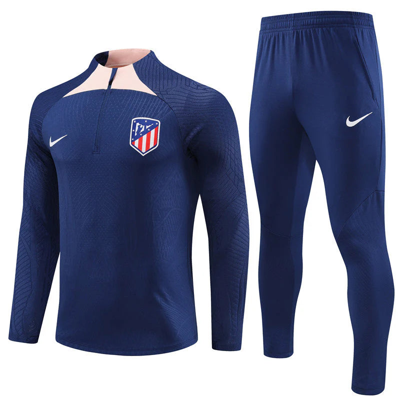 ATLÉTICO DE MADRID CAMISETA MANGA LARGA + PANTALONES XI 23/24 HOMBRE