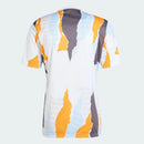 CAMISETA REAL MADRID PREJUEGO 24/25 NARANJA HOMBRE