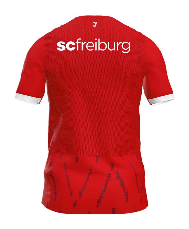 SC Freiburg - 2024/2025 - Camiseta Freiburg - Uniforme Freiburg - Nike Freiburg - Diseño moderno - Rojo - Blanco - Negro - Bundesliga - Copa de Alemania - Patrón gráfico - Identidad del club - Gola redonda - Escudo del club - Logo de Nike - Patrocinio Schwarzwald-Baar Klinikum - Tecnologías innovadoras - Confort - Rendimiento.