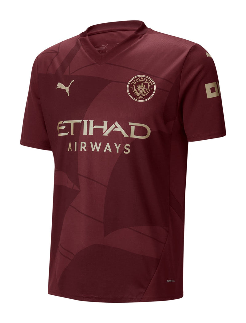 Manchester City 2024/2025 - Tercera camiseta Manchester City - Puma Manchester City - Premier League - FA Cup - Champions League - Diseño innovador - Diseño audaz - Vanguardia - Pasión - Gola - Detalles en las mangas - Escudo del Manchester City - Logo de Puma - Tecnologías innovadoras - Confort - Rendimiento.