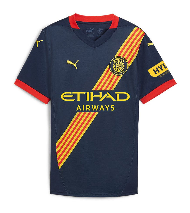 Girona FC 2024/2025 - Camiseta alternativa Girona - Puma Girona - LaLiga EA Sports - Champions League - Diseño moderno - Detalles únicos - Azul - Blanco - Rojo - Gola redonda - Escudo del Girona FC - Logo de Puma - Historia del club - Identidad del club - Tecnologías innovadoras - Confort - Rendimiento. 