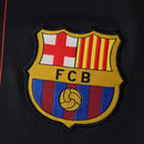 CAMISETA BARCELONA NEGRA Y NARANJA HOMBRE 25/26