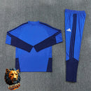 CHÁNDAL MEDIA CREMALLERA + PANTALONES MANCHESTER UNITED AZUL Y AZUL MARINO 26/27 HOMBRE