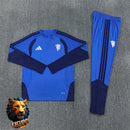 CHÁNDAL MEDIA CREMALLERA + PANTALONES MANCHESTER UNITED AZUL Y AZUL MARINO 26/27 HOMBRE