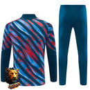 CHÁNDAL MEDIA CREMALLERA + PANTALONES ARSENAL AZUL CAMUFLAJE Y ROJO 26/27 HOMBRE