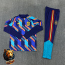 CHÁNDAL MEDIA CREMALLERA + PANTALONES ESPAÑA AZUL CAMUFLAJE Y AMARILLO 26/27 HOMBRE