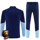 CHÁNDAL MEDIA CREMALLERA + PANTALONES AJAX AZUL MARINO Y AZUL CELESTE 26/27 HOMBRE