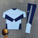 CHÁNDAL MEDIA CREMALLERA + PANTALONES AJAX AZUL CELESTE Y AZUL MARINO 26/27 HOMBRE