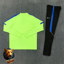 CHÁNDAL MEDIA CREMALLERA + PANTALONES ATLÉTICO DE MADRID VERDE FLÚOR Y AZUL 26/27 HOMBRE