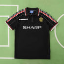 MANCHESTER UNITED 98/99 NEGRA HOMBRE (RETRO)