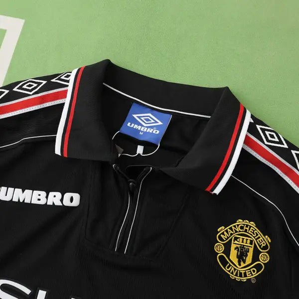 MANCHESTER UNITED 98/99 NEGRA HOMBRE (RETRO)