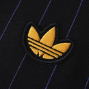 MANCHESTER UNITED ENTRANIMENTO 25/26 NEGRA HOMBRE (RETRO)