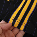 MANCHESTER UNITED ENTRANIMENTO 25/26 NEGRA HOMBRE (RETRO)