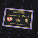 MANCHESTER UNITED ENTRANIMENTO 25/26 NEGRA HOMBRE (RETRO)