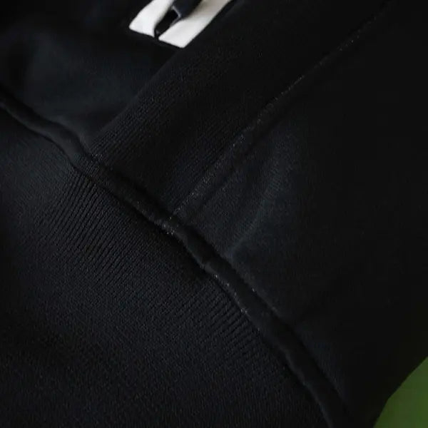 CHANDAL MANCHESTER UNITED NEGRA 25/26