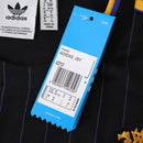 MANCHESTER UNITED ENTRANIMENTO 25/26 NEGRA HOMBRE (RETRO)